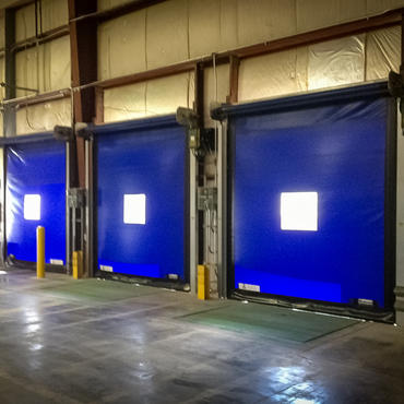 Blue durable high speed roll up doors.